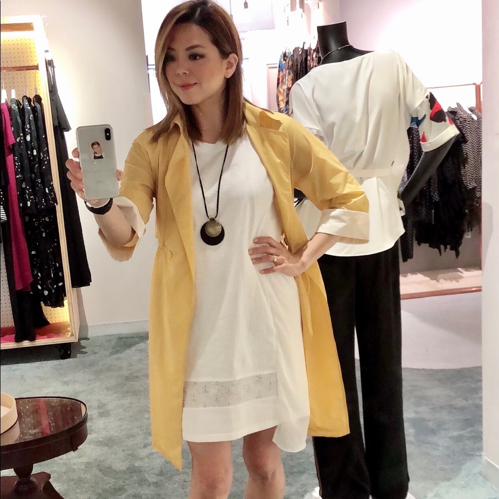 Light weight yellow jacket and white cotton dress